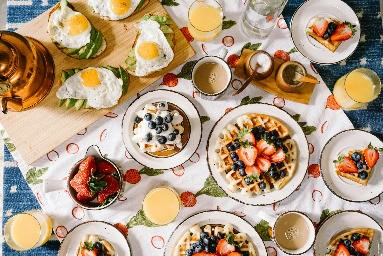 Breakfast spread with fresh fruits and pastries